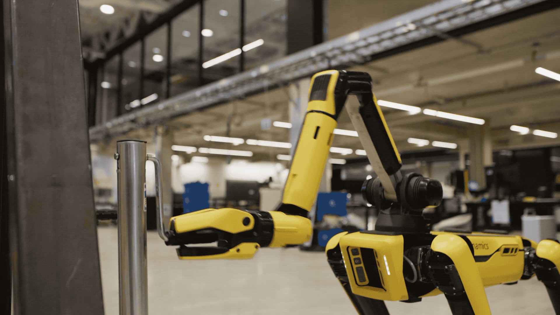 boston dynamics’ spot is getting an arm and self-charging dock next year