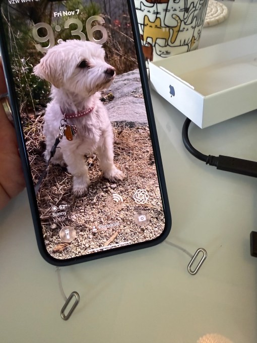 i tried the apple crossbody strap. it’s convenient, but the phone looks silly when the strap is removed.