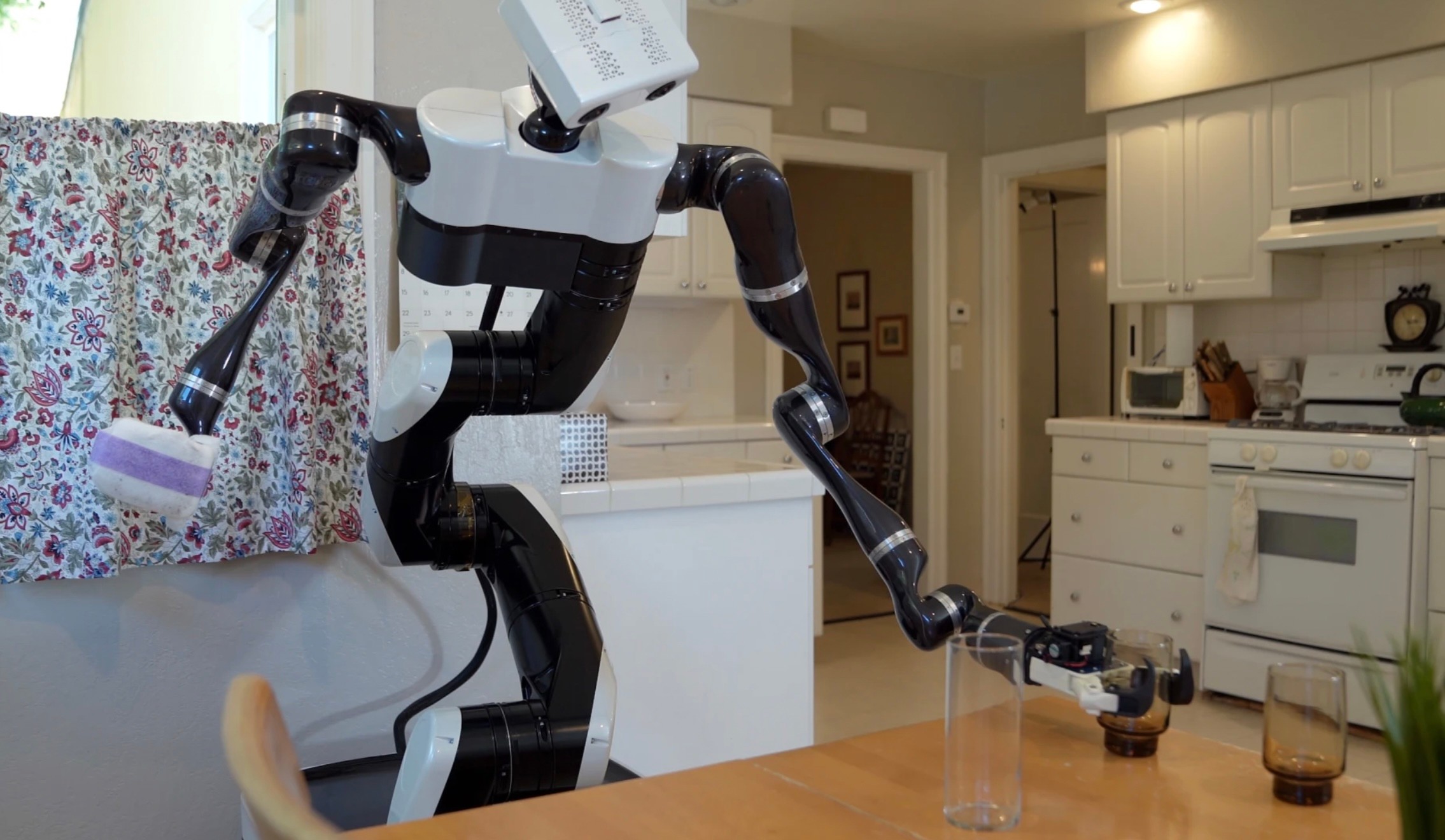 toyota research institute shows how its robotics work with difficult surfaces in the home