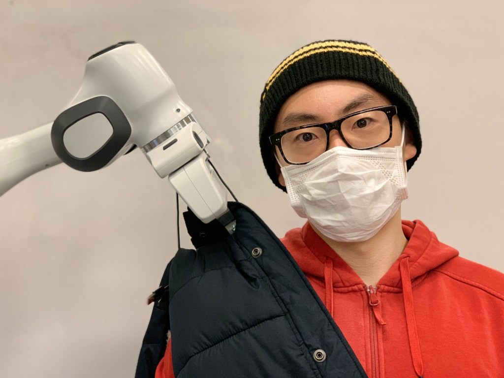 Programming Robots to Put on Jackets: The Challenges