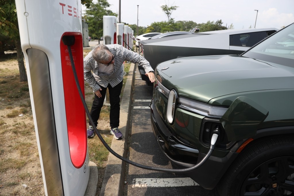 Tesla & Rivian Charging Networks Ranked Best | Consumer Reports
